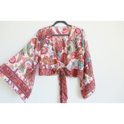 White wrap blouse with colorful pattern