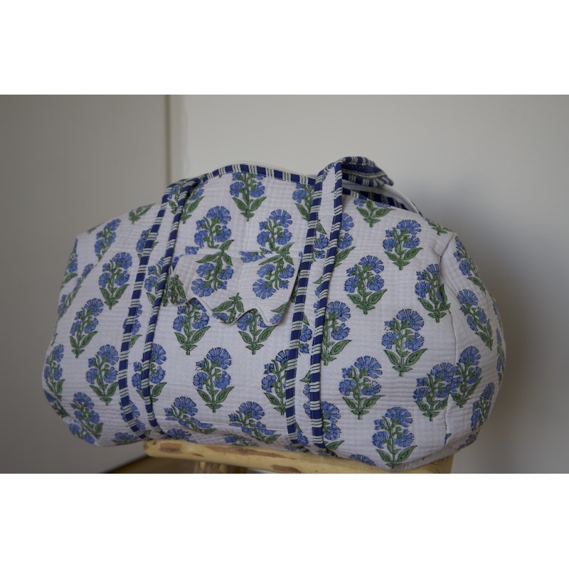 Sac de voyage matelassé bleu à fleurs