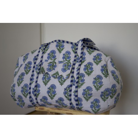 Sac de voyage matelassé bleu à fleurs