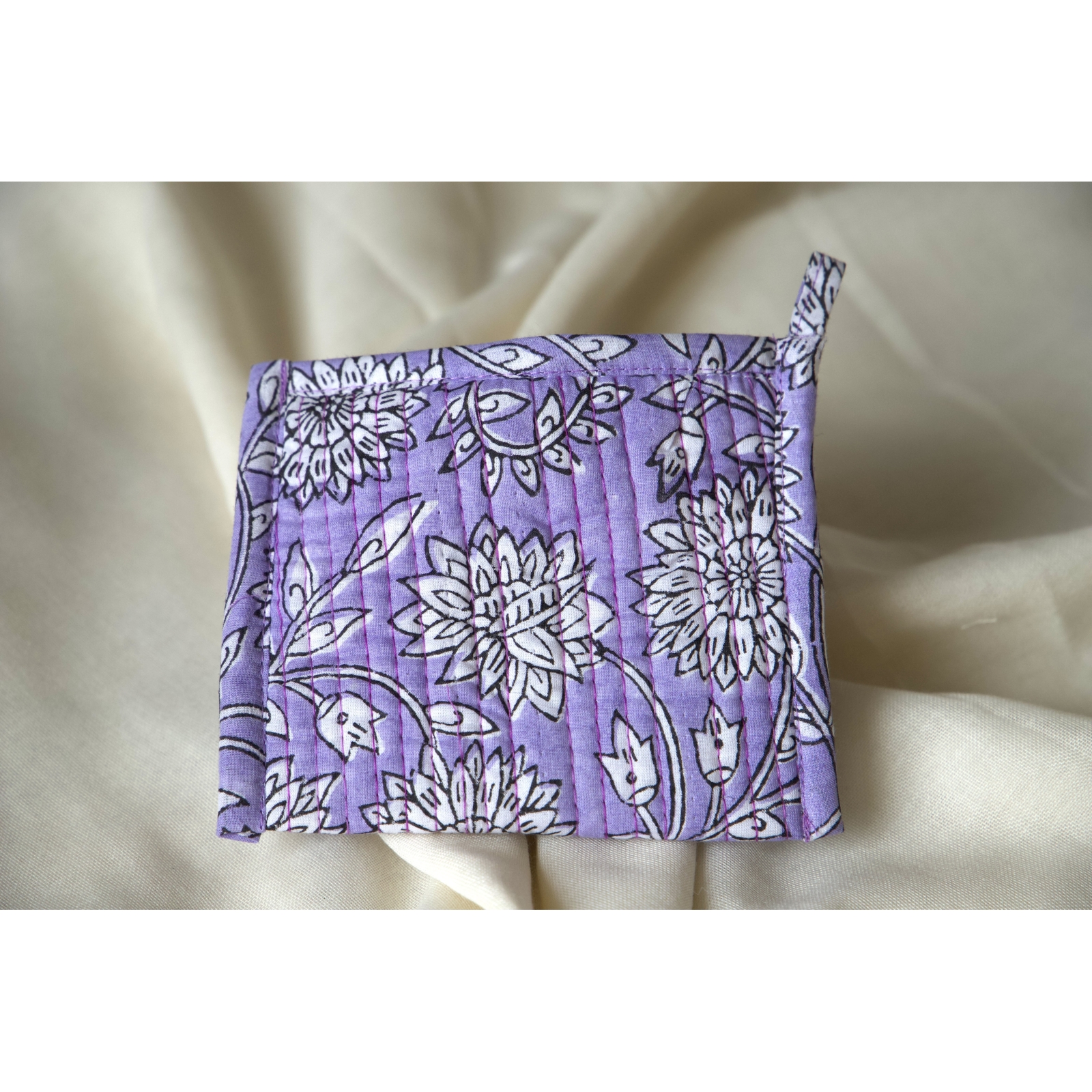 Purple quilted coin pouch