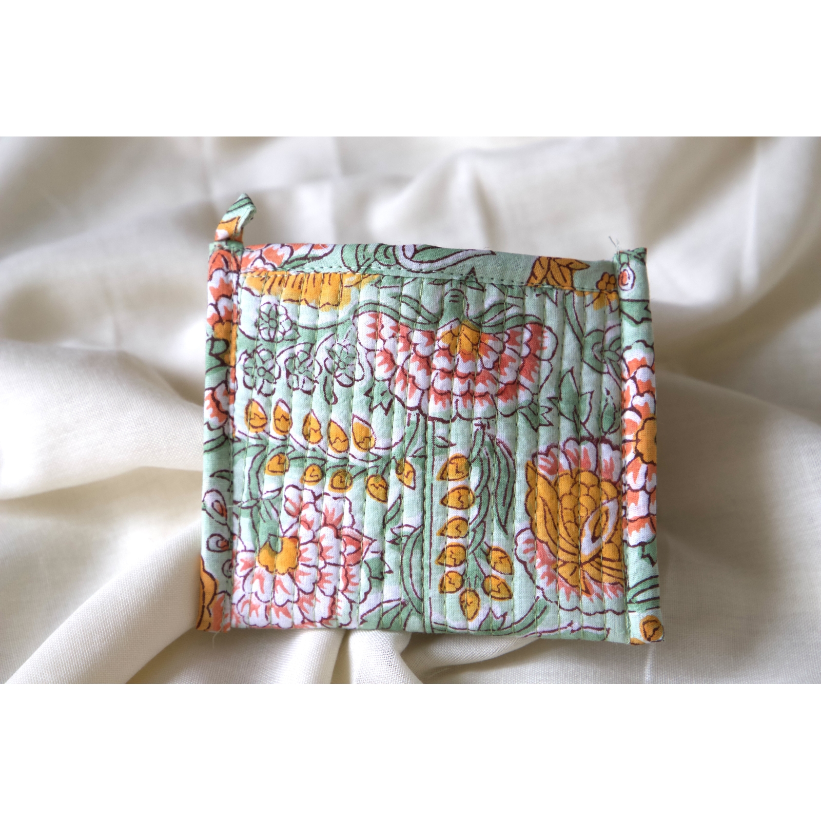 Yellow and green quilted coin pouch