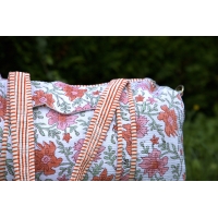 Sac de voyage matelassé fleuris blanc orange rose