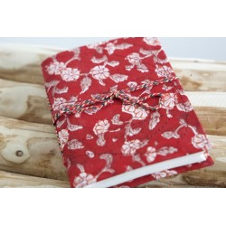 Red notebook with recycled...
